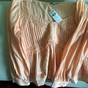 American Eagle peachy lace like shirt.